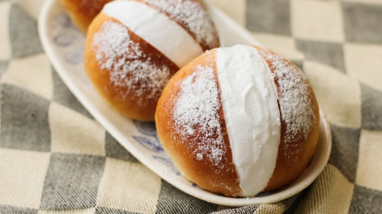 Sweet maritozzi brioche buns filled with whipped cream