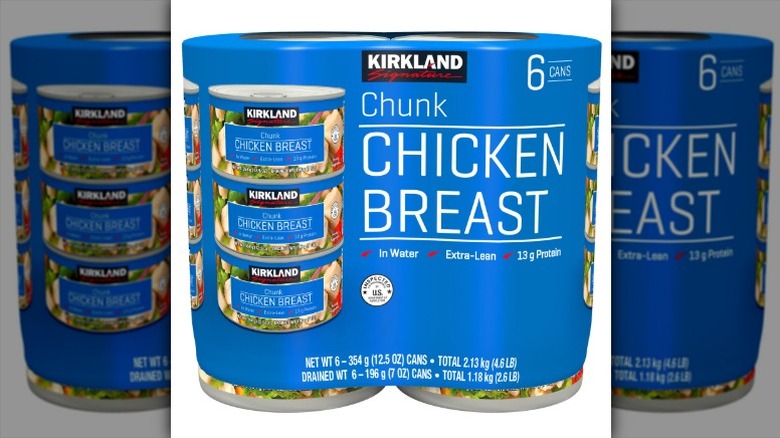 shrink-wrapped cans of Kirkland Signature Chunk Chicken Breast