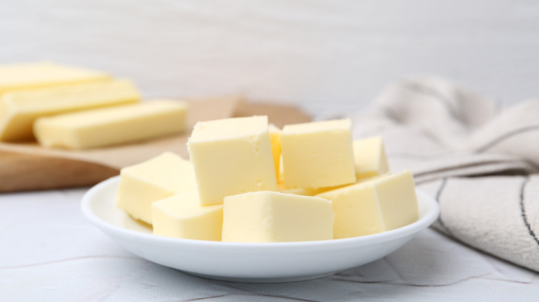 Cubes of butter on a white plate