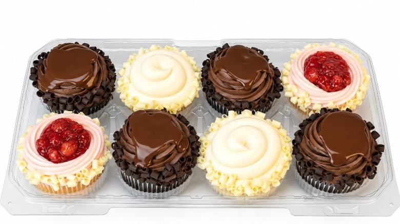 Member's Mark Gourmet Cupcakes in clear plastic packaging on a white background.