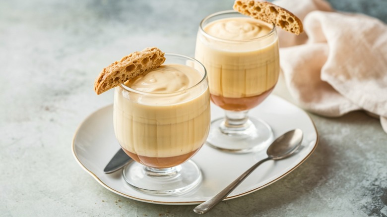 Zabaglione dessert with biscotti slices as garnish