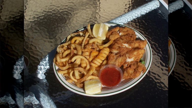Battered fish with curly fries