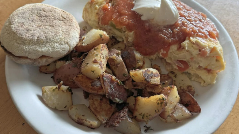 Omelet with potatoes and English muffin