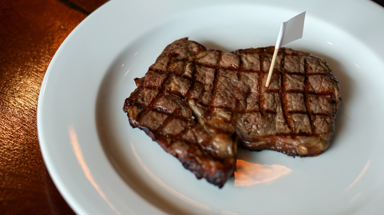 Steak on white plate