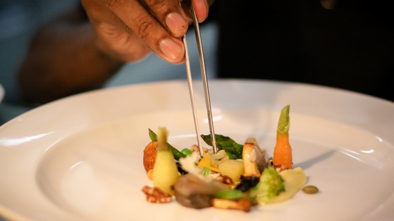 Chef plating food