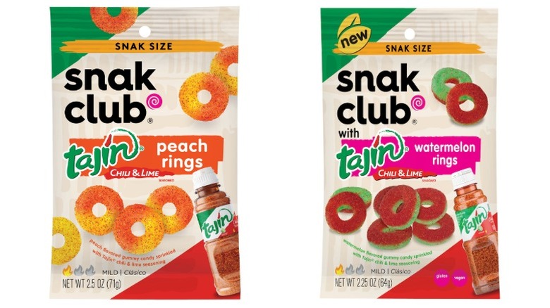 Two bags of Snak Club Tajín Peach Rings and Tajín Watermelon Rings on a white background.