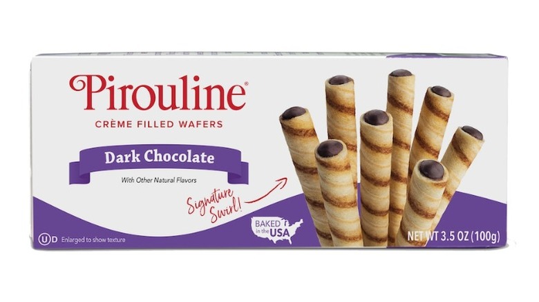 A box of dark chocolate Pirouline crème-filled wafers on a white background.