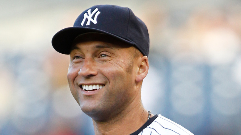 Derek Jeter smiling in Yankee uniform