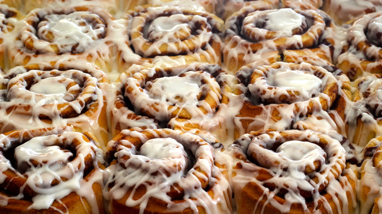 Rows of iced cinnamon buns