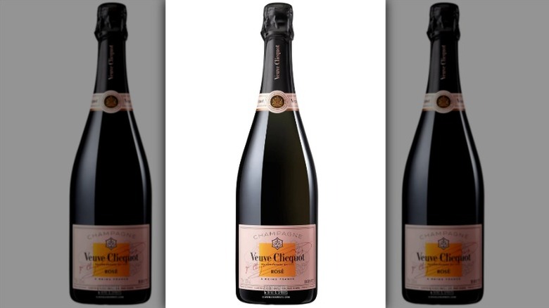 A bottle of Veuve Clicquot Brut Rosé Champagne on a white background.