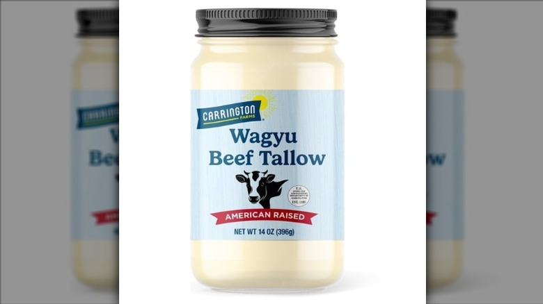 A jar of Carrington Farms Wagyu Beef Tallow on a white background.