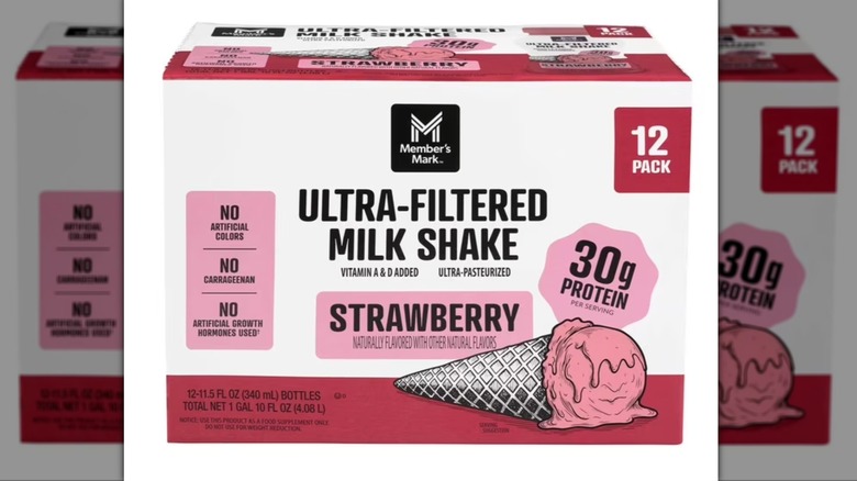 Box of Member's Mark Ultra-filtered protein milk shakes in strawberry flavor on a white background.