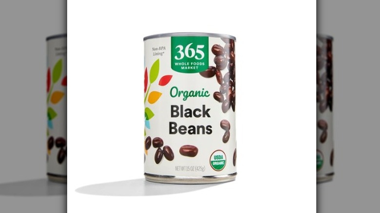A can of 365 by Whole Foods Market Organic Black Beans on white background