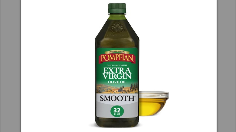 Bottle of Pompeian Extra Virgin Olive Oil Smooth on white background