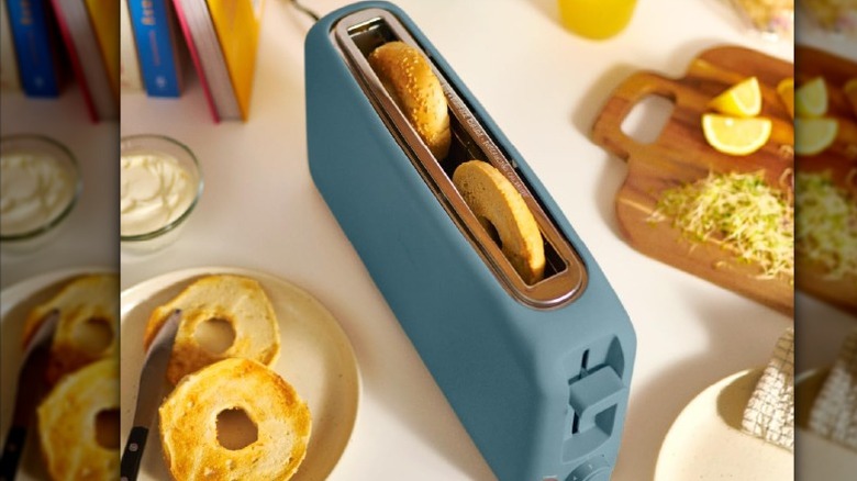 Blue bella Two-Slice Slim Toaster toasting a bagel