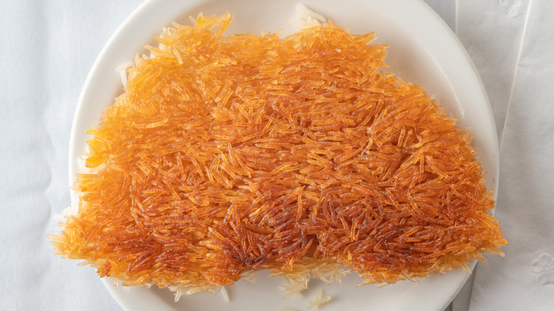 a golden piece of tahdig crispy rice