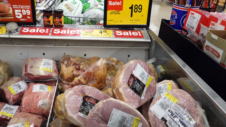 Hams in grocery store cooler