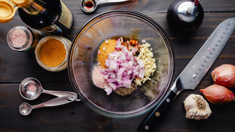 Mixing together marinade ingredients in a bowl