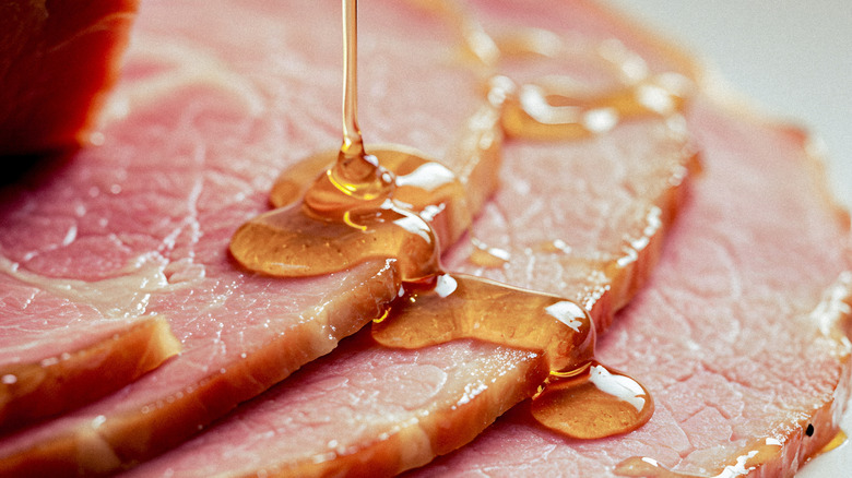 Honey pouring onto ham