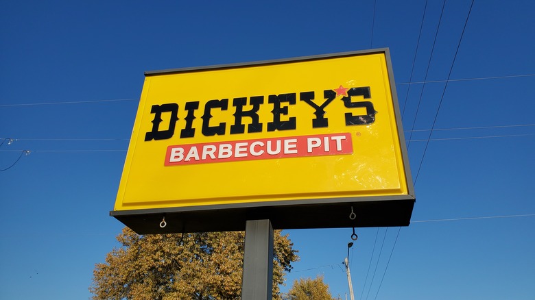 Dickey's Barbecue Pit sign against a blue sky