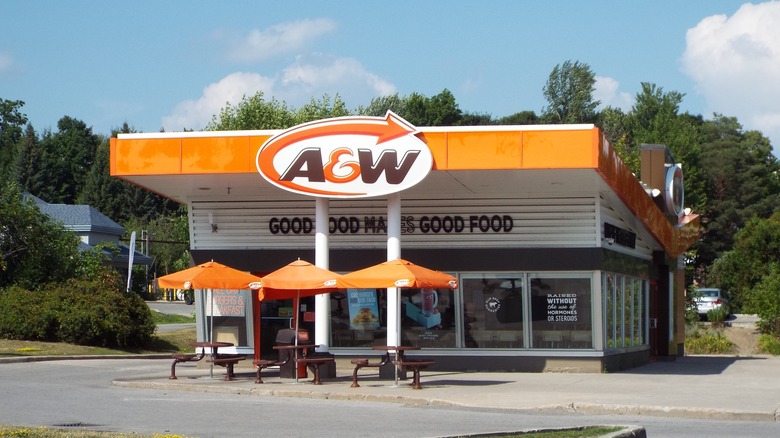 Wide shot exterior of an A & W restaurant on a sunny day