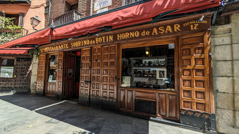 Botin restaurant exterior with wooden shutters and doors