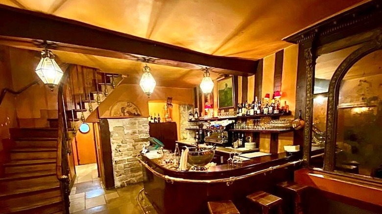 Old wooden bar at La Petite Chaise restaurant
