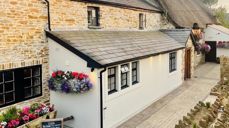 Exterior of The Old House pub in Wales