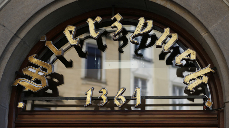 Wierzynek glass window with old lettering