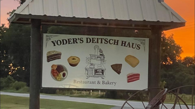 Yoder's Deitsch Haus sign at sunset