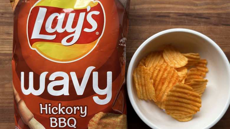 Wavy Lay's Hickory BBQ chips bag and in bowl