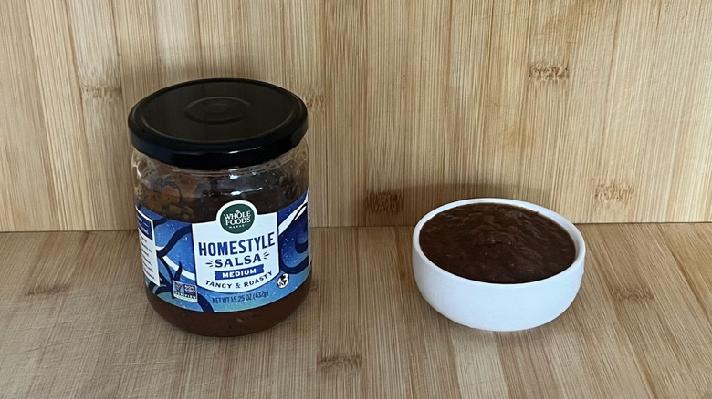 A jar of Whole Foods brand salsa
