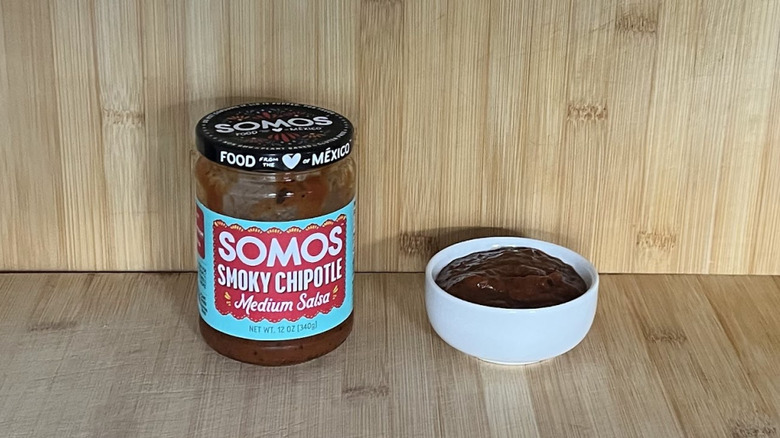 A jar and a little bowl of Somos salsa
