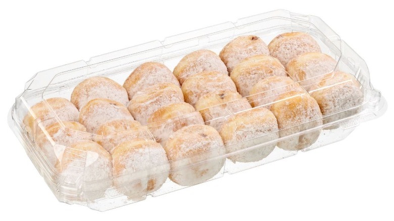 Costco Mini Beignets Filled with Chocolate Hazelnut in clear plastic clamshell packaging on a white background.
