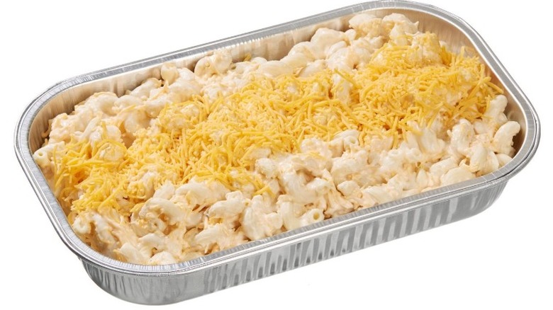 Kirkland Signature Mac and Cheese in a foil pan on a white background.