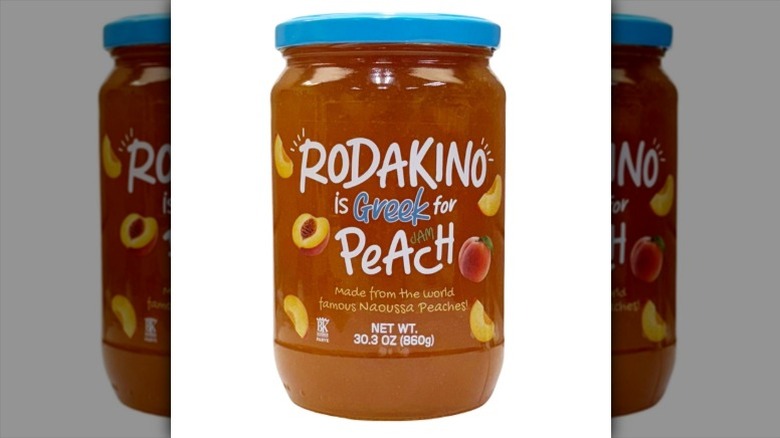 A jar of Rodakino Peach Jam on a white background.