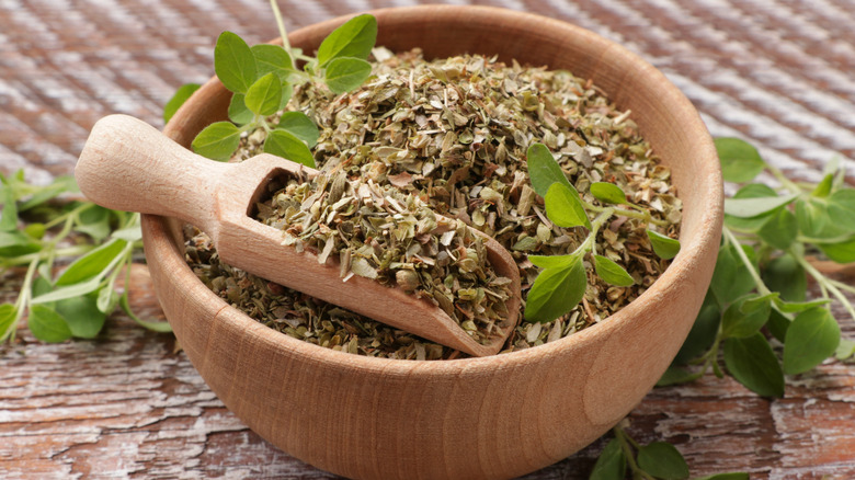 Dried organo in a wooden bowl