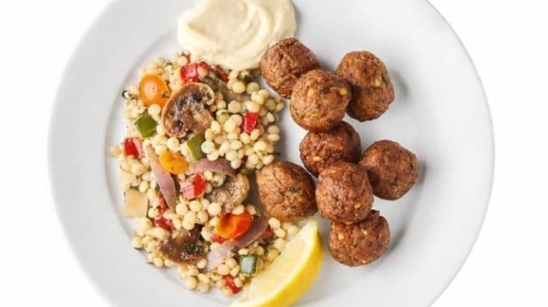 Ikea restaurant falafel balls and couscous on a white plate