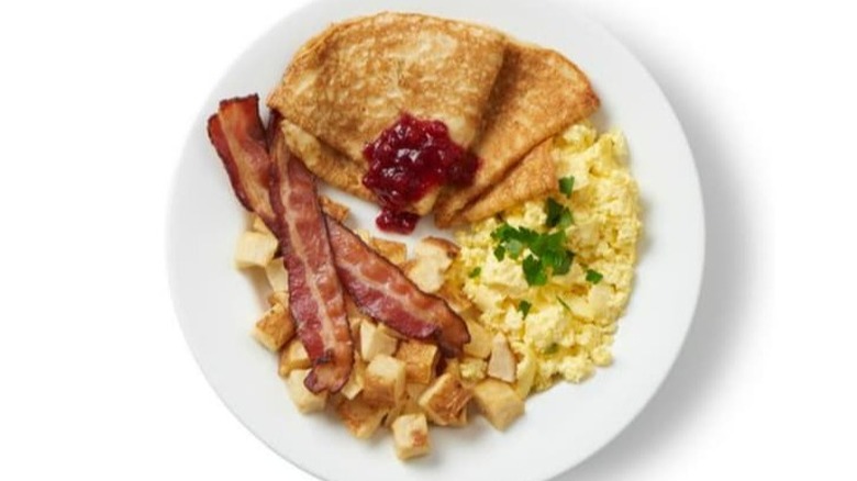 Ikea restaurant breakfast plate with pancakes, bacon, eggs, and potatoes