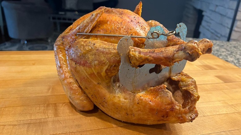 roast chicken impaled on a Turbo Trusser