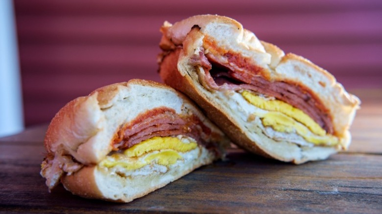 Breakfast sandwich with pork roll and egg on a kaiser roll