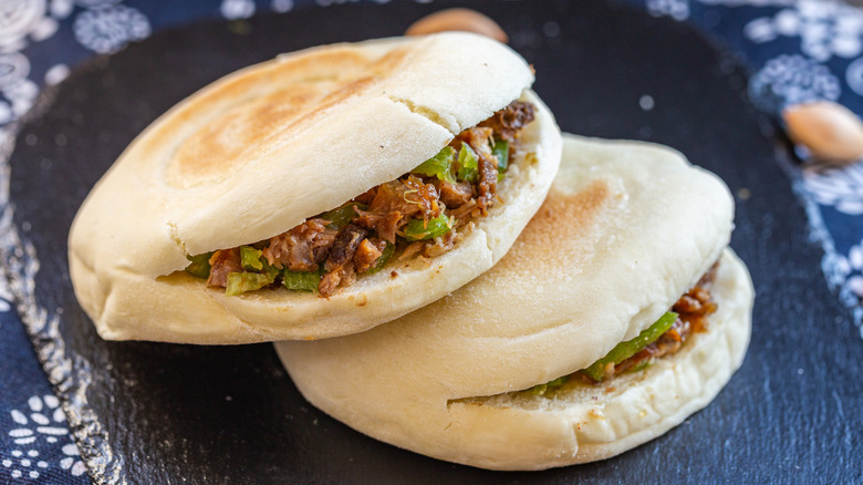 two chinese hamburger on blue plate
