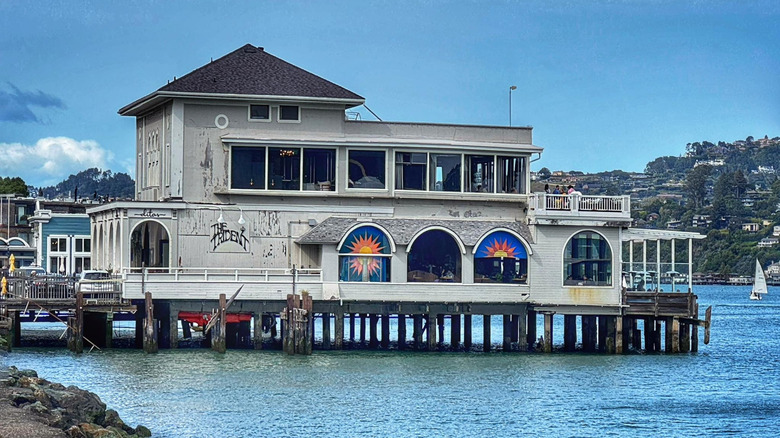 The Trident Bar & Restaurant on Sausalito pier with funky artwork-filled windows