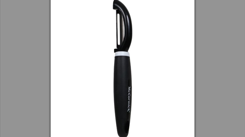 Dollar Tree McCormick vegetable peeler on a white background