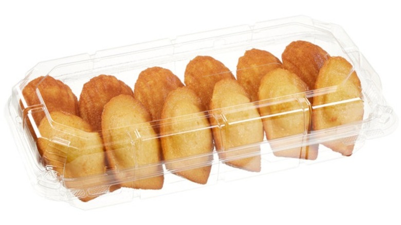 Kirkland Signature Traditional Madeleines in clear plastic clamshell packaging on a white background.