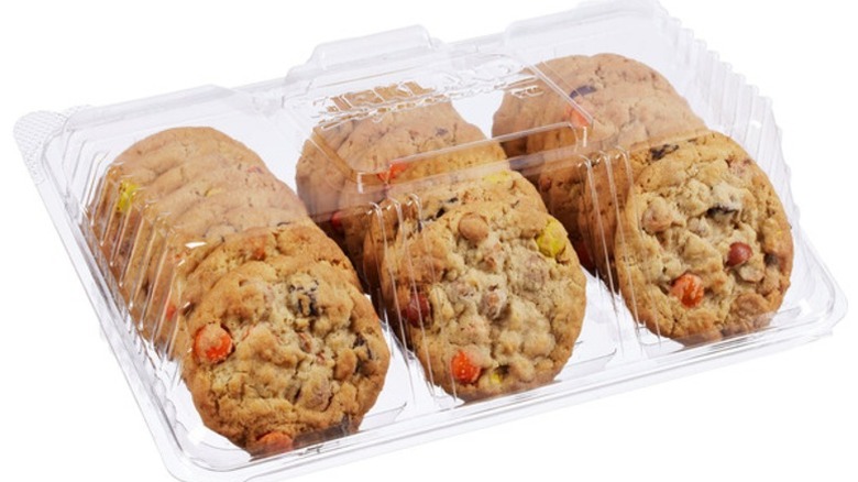 Kirkland Signature Peanut Butter Monster Cookies in a clear plastic clamshell package on a white background.