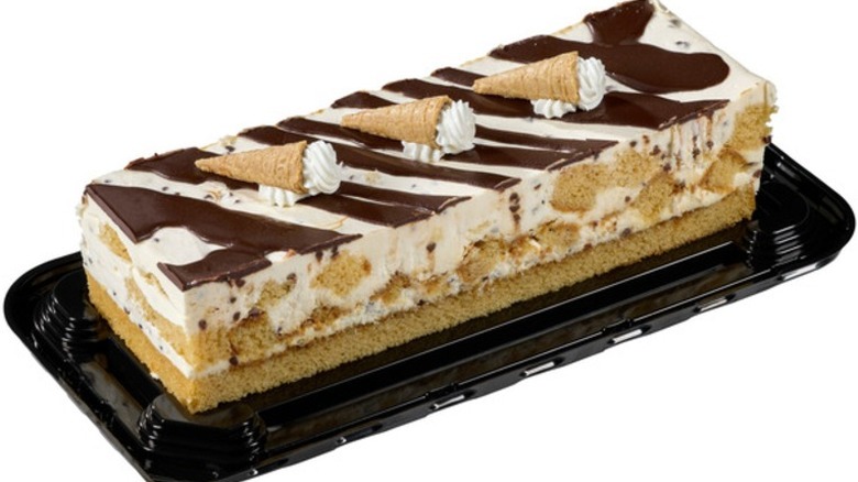 Kirkland Signature Waffle Cone Bar Cake on a black plastic base on a white background.