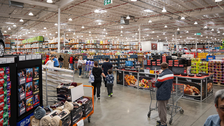 A variety of people shopping at Costco
