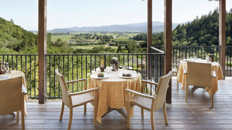 Auberge du Soleil restaurant terrace with views of trees, Napa Valley, California
