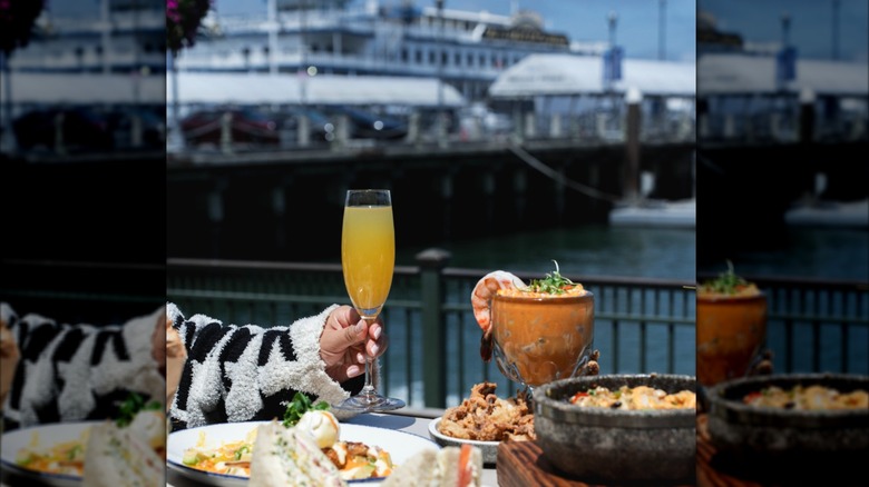 La Mar restaurant table with seafood and drinks, San Francisco, California